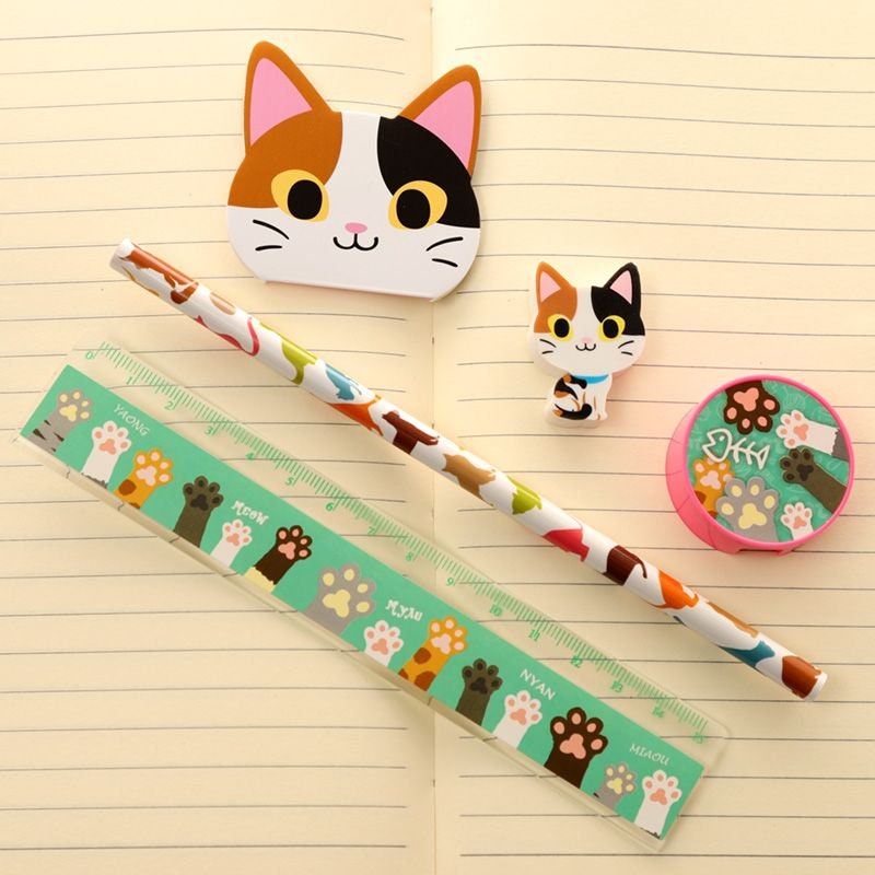 Cute stationery for kids. Cat shaped sticky notes, eraser and cat themed ruler, pencil and sharpener.